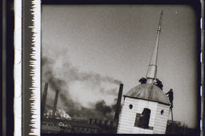 Männer auf dem Kirchturm